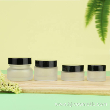 Wholesale Cosmetic Frosted glass bottle with black caps, frosted glass bottles/jars